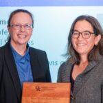 Dr. Erin Haramoto receiving her teaching award at the University of Kentucky